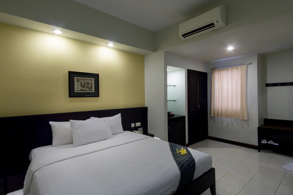 Hotel Quirin Semarang Habitación foto