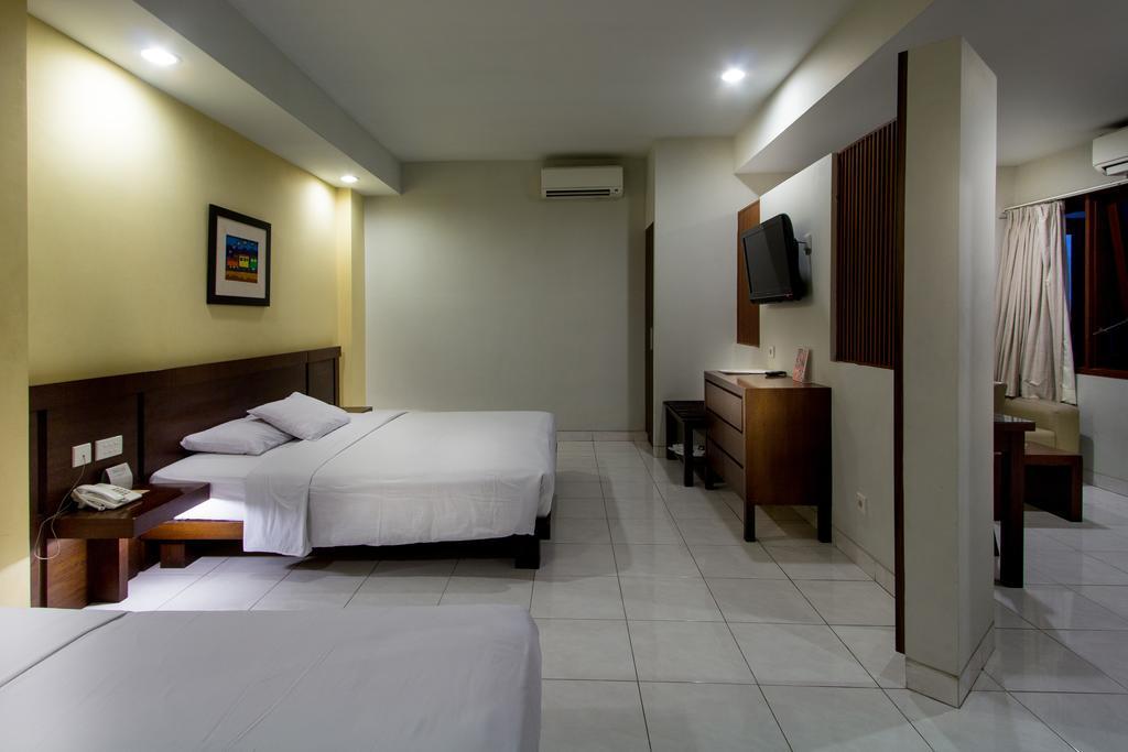 Hotel Quirin Semarang Habitación foto