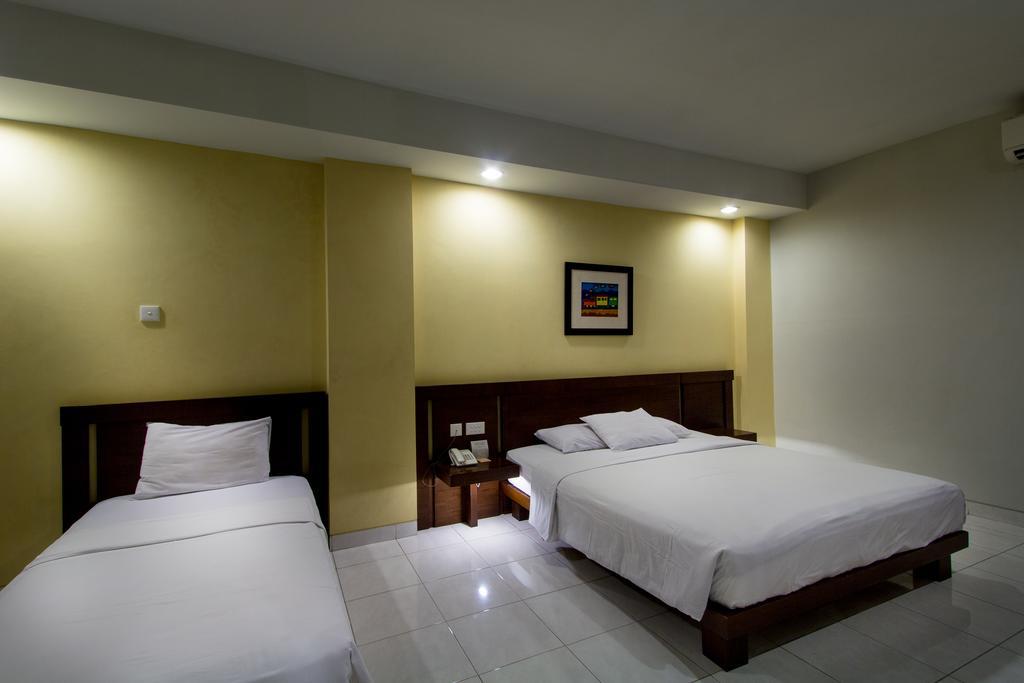 Hotel Quirin Semarang Habitación foto